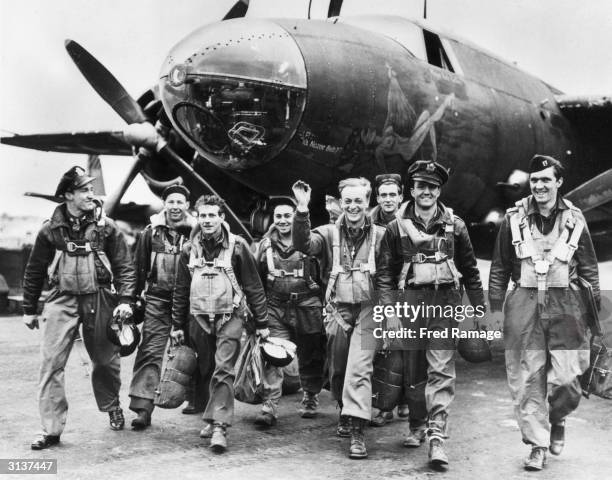 Bomber crews of the US Ninth Airforce leave their B26 Marauder aircraft after returning from a mission to support the D-Day landings in Normandy by...