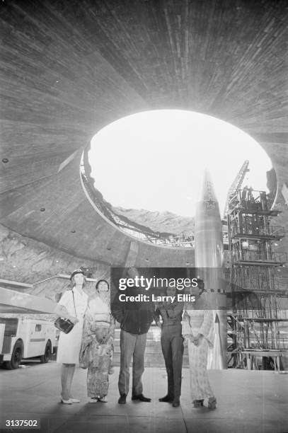 Lois Maxwell , Sean Connery , Akiko Wakabayashi, Mie Hama and Karin Dor on the massive Pinewood set of the new Bond film 'You Only Live Twice',...