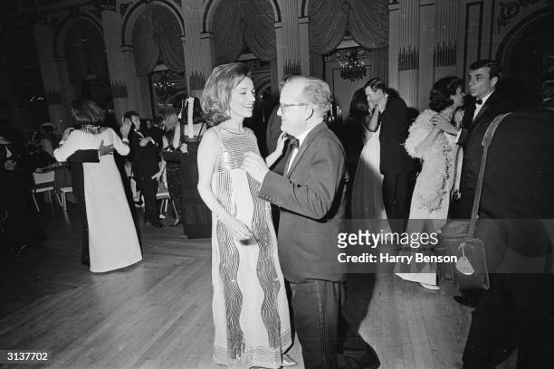 American novelist, Truman Capote , dancing with Jackie Kennedy's sister, Princess Lee Radziwill, at his Black-and-White Ball at the Plaza Hotel, New...