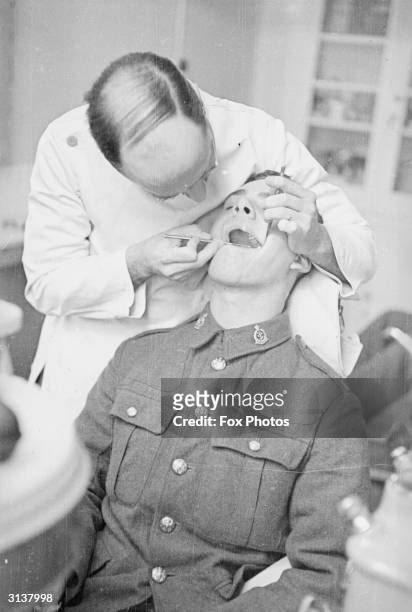 Dental surgeon at work in the Royal Army Medical Corps Hospital at Millbank in London.