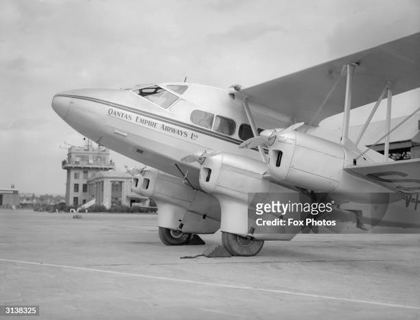 The first Anglo-Australian airliner at Croydon Airport carries passengers for Qantas Empire Airways, September 1934.