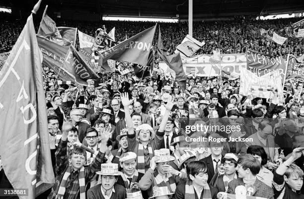 Everton supporters giving strong vocal support for the Merseyside team at the FA Cup Final which they won, beating Sheffield Wednesday 3 - 2. Charles...