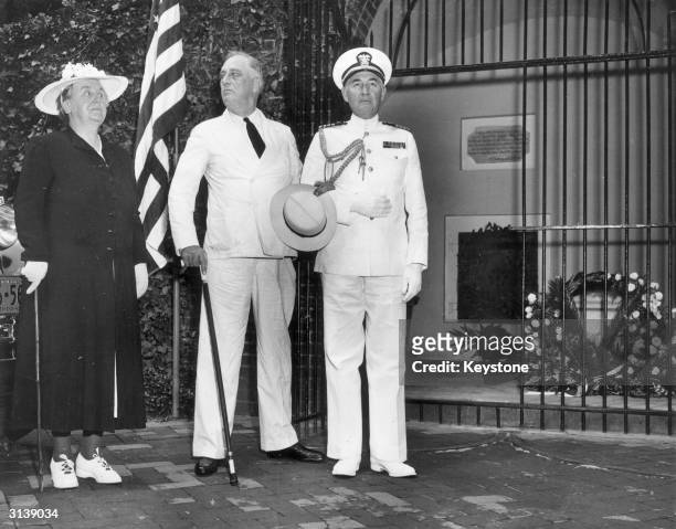 Queen Wilhelmina of the Netherlands with President Franklin Delano Roosevelt 32nd President of the USA and on the right his naval aide Captain John...