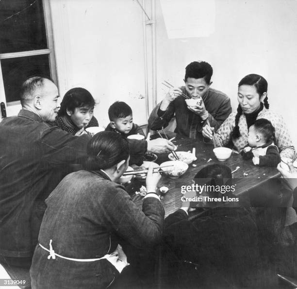 Working Class Food Example Working Class Family Eating Photos and Premium High Res Pictures ...