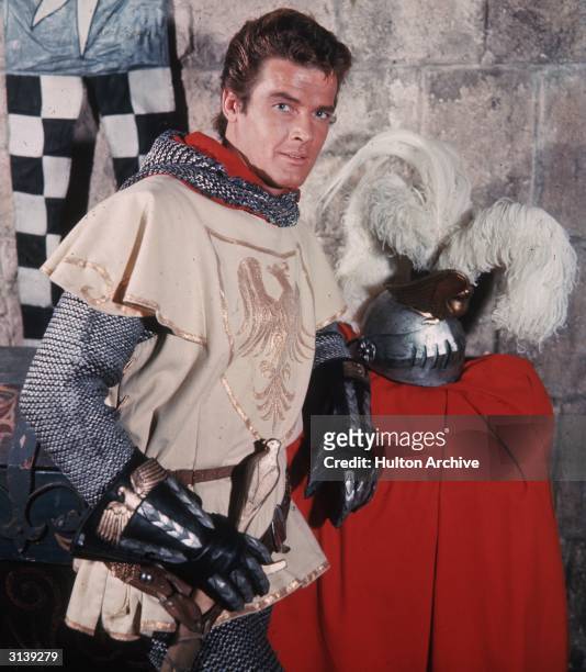 British actor Roger Moore, later famed for his portrayals of The Saint and James Bond, stars as Sir Wilfred of Ivanhoe in a television remake of...