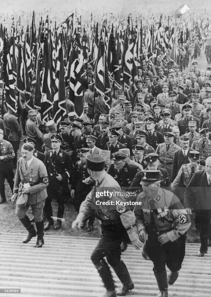 Ww2 Hitler Rally Nazi leader Adolf Hitler, closely followed by officers including ...
