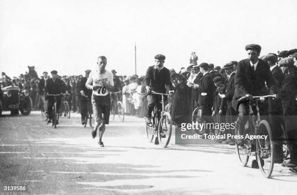 Morris running in the Marathon during the 1908 Olympic Games in London.