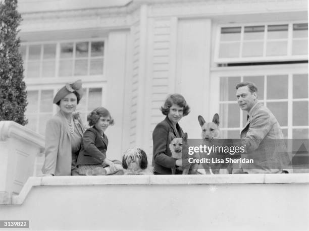 The Royal family at the Royal Lodge in Windsor, Queen Elizabeth, Princess Margaret , Princess Elizabeth and King George VI of Great Britain with the...