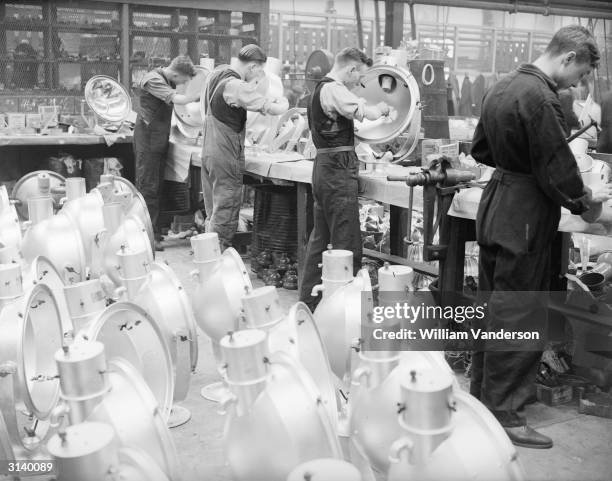 Workers at the General Electric Company works in Birmingham making floodlights for the Jubilee celebrations at Buckingham Palace, London.