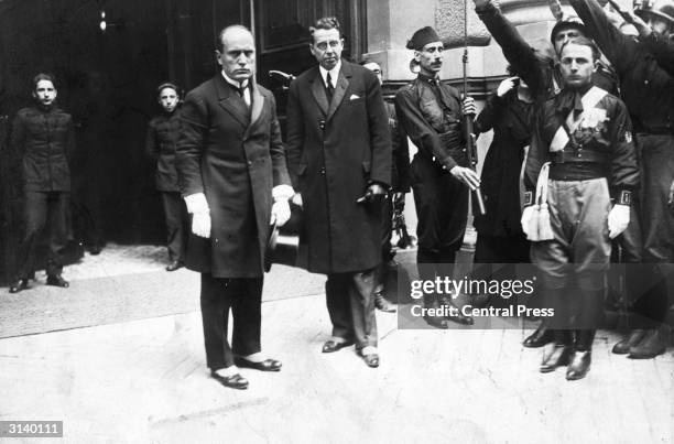 Italian dictator Benito Mussolini accompanied by Giacomo Acerbo, entering the Quirinale Palace, Rome, to be received by King Victor Emmanuel III,...