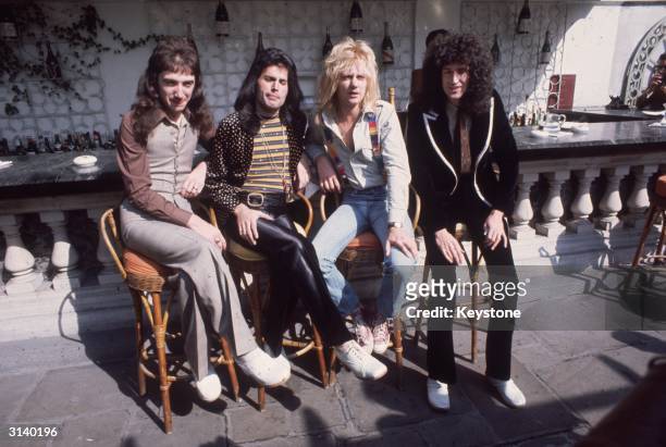 British rock group Queen at Les Ambassadeurs, where they were presented with silver, gold and platinum discs for sales in excess of one million of...