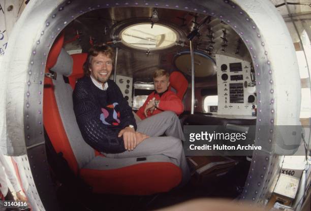 Tycoon Richard Branson in the cabin of the Virgin balloon, 'Virgin Atlantic Flyer' at Gatwick airport before it was taken to its starting point in...