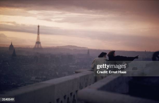 Premium Rates Apply. 1954: The view from Notre Dame Cathedral in Paris toward the Eiffel Tower. Colour Photography book.