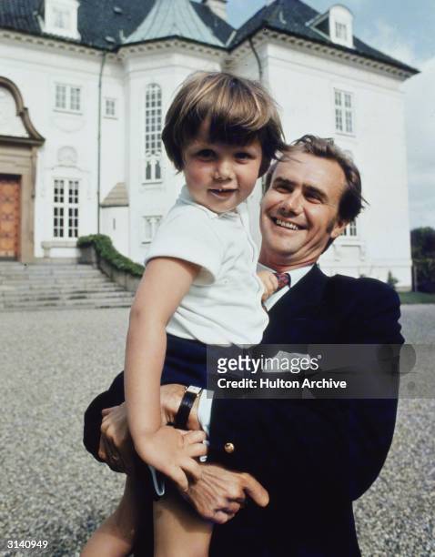 Prince Henrik of Denmark, the husband of Queen Margrethe, with their son Crown Prince Frederik during a holiday at Marselisborg Castle, Aarhus,...
