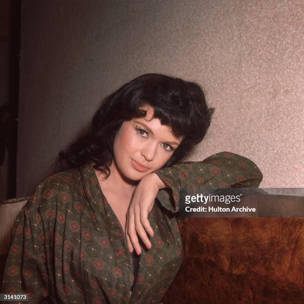 Hollywood film star Jayne Mansfield , formerly Vera Jane Palmer, in unfamiliar guise as a brunette. She had a short career as a kind of living parody...