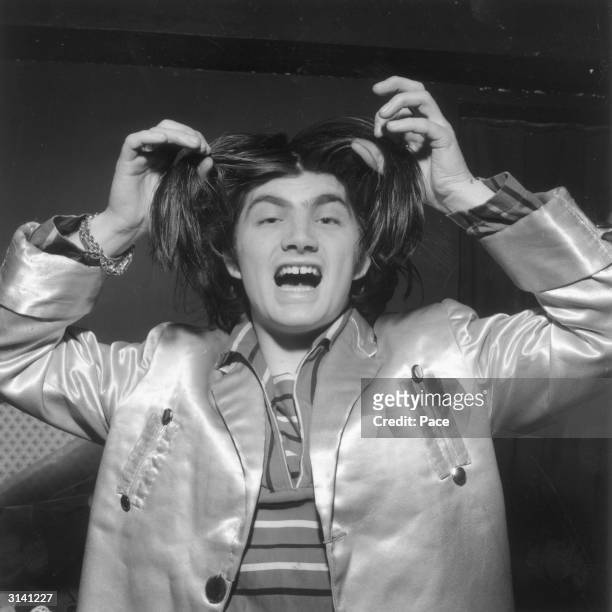 Pop singer, pirate radio station operator and would-be member of parliament, Screaming Lord Sutch dancing at the Black Cat Club in Woolwich.