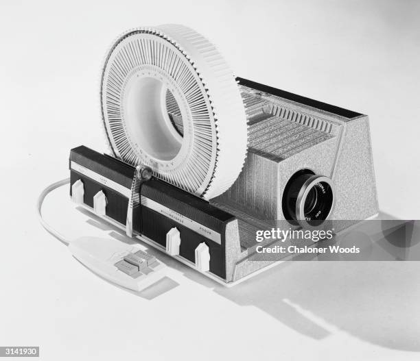 Slide projector with slide carousel.