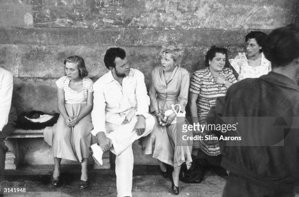 Orson Welles in Venice during a break from filming 'Othello' which he directed and starred in.