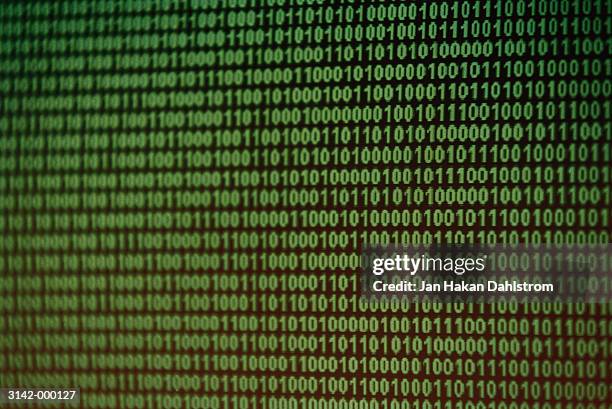 binary digits on screen - binary code stock pictures, royalty-free photos & images