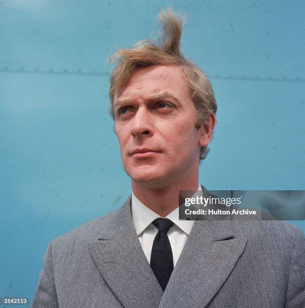 British actor Michael Caine, the star of 'Alfie' and 'Get Carter', looking windswept.