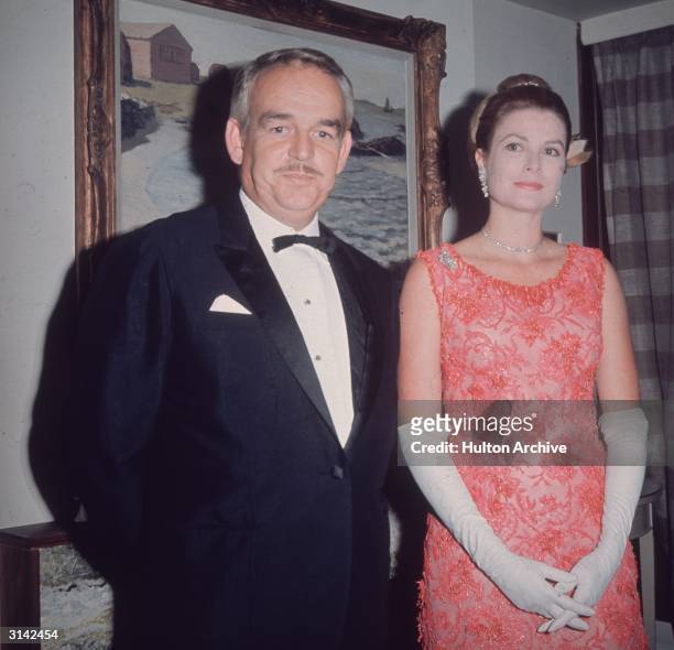 Prince Rainier III of Monaco and his wife, the former actress Grace Kelly , attend the Bal Petits Lits Blancs at Powerscourt, Enniskerry, County...