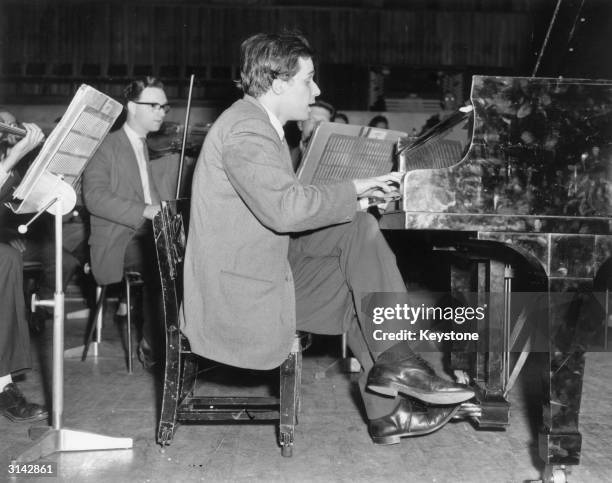 Glenn Gould's idiosyncratic approach to classical music brought both praise and critisicm in equal parts. Here he is pictured during rehearsals for a...