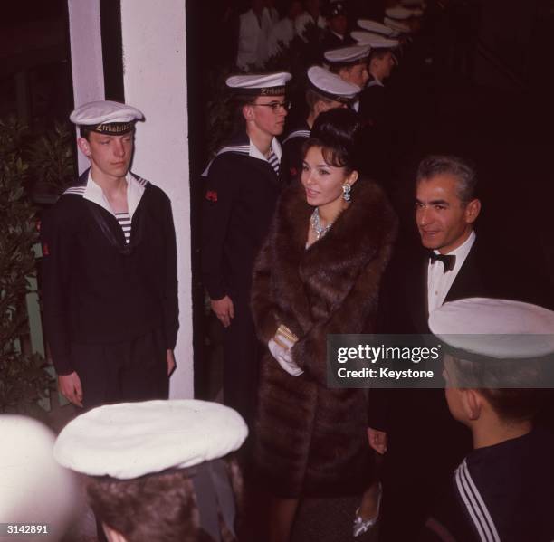 Muhammad Reza Pahlavi, the Shah of Iran with his third wife Farah Diba in Amsterdam, Holland for the silver wedding celebrations of Queen Juliana and...