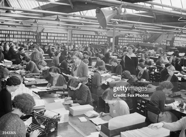 Office workers at Vernon's football pools in Liverpool.