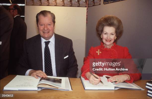 The Earl and Countess Spencer autographing their book,' The Spencers on Spas'.