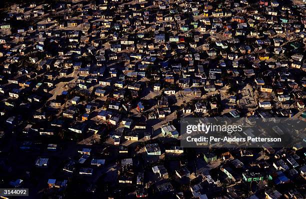 An early morning aerial view is seen of the Harare section of Khayelitsha, the largest black township about 20 miles outside Cape Town on October 10,...