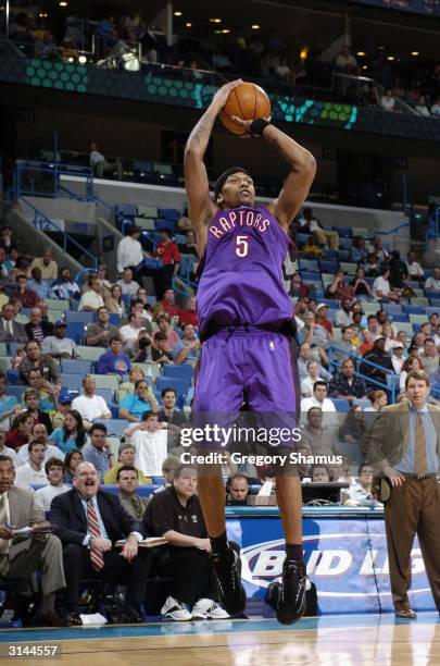 Jalen Rose of the Toronto Raptors shoots against the New Orleans Hornets during the game at New Orleans Arena on March 21, 2004 in New Orleans,...