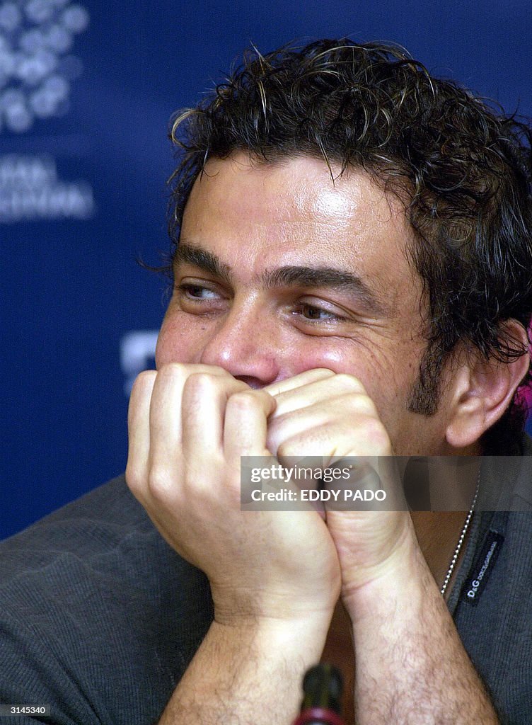 Amro Rabi Egyptian singer Amro Diab poses for a picture in Dubai 24 March 2004 ...
