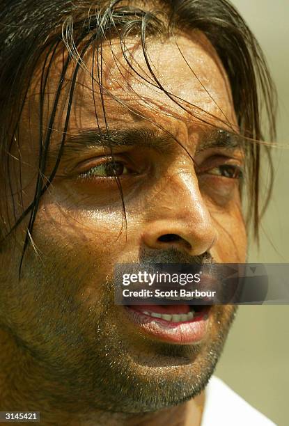 Shoaib Akhtar of Pakistan looks on during the Pakistan team training session ahead of the first test match between Pakistan and India on March 27,...