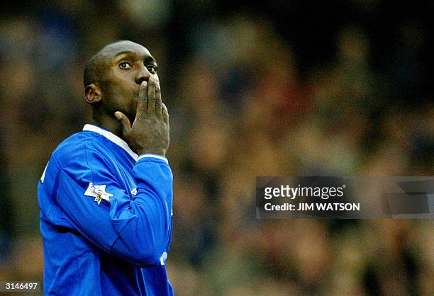 Chelsea's Jimmy Hasselbaink blows a kiss to the crowd after scoring a hat trick against Wolverhampton during their Premiership football match 27...