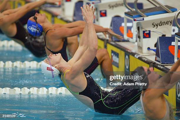 Giaan Rooney of Australia in action in the womens 100m backstroke semi final during day 2 of the Telstra Olympic Team Swimming Trials at Homebush...