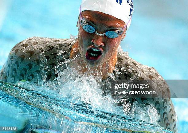 Australian swimmer Brooke Hanson, powers through the pool on her way to setting the second fastest time in the semi-finals of the 100m Breaststroke...