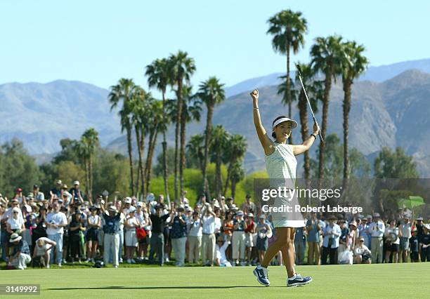 Grace Park celebrates a one-stroke victory at the Kraft Nabisco Championship at the Mission Hills Country Club March 28, 2004 in Rancho Mirage,...