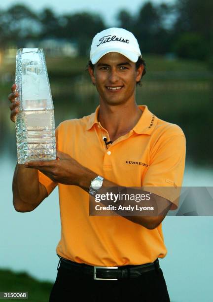 Adam Scott of Australia holds the trophy after winning The Players Championship on March 28, 2004 at the TPC at Sawgrass in Ponte Vedra, Florida.