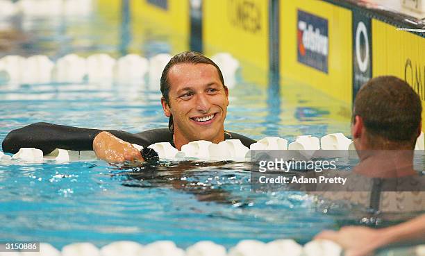 Ian Thorpe of Australia celebrates victory in the mens 200m freestyle final during day 3 of the Telstra Olympic Team Swimming Trials at Homebush...