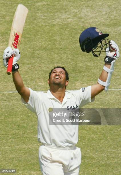 Sachin Tendulkar of India celebrates after reaching his century during day 2 of the 1st Test Match between Pakistan and India at Multan Stadium on...