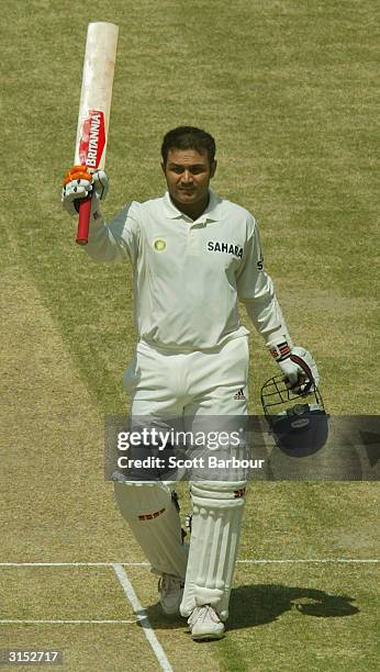 Virender Sehwag of India celebrates reaching his 300 during day 2 of the 1st Test Match between Pakistan and India at Multan Stadium on March 29,...