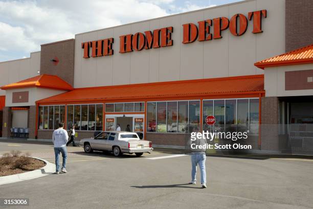 Customers shop at a recently opened Home Depot Store March 29, 2004 in Chicago, Illinois. Home Depot has launched an online gift registry where...