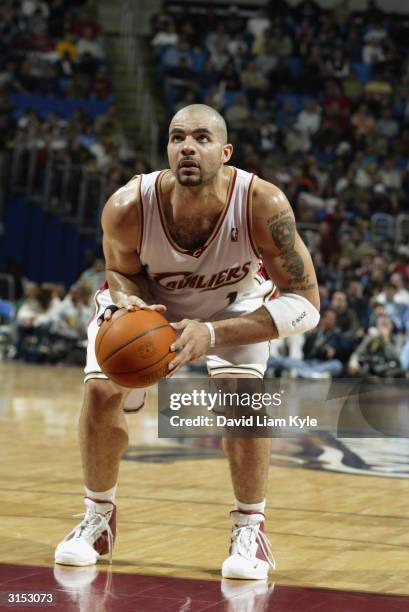 Carlos Boozer of the Cleveland Cavaliers shoots a free throw during the game against the Utah Jazz on March 19, 2004 at Gund Arena in Cleveland,...