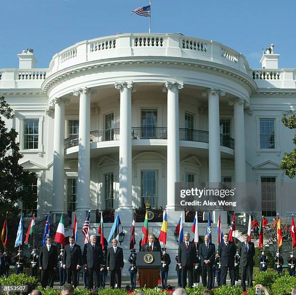 President George W. Bush speaks as Latvia's Prime Minister Indulis Emsis, Slovenia's Prime Minister Anton Rop, Lithuania's Prime Minister Algirdas...