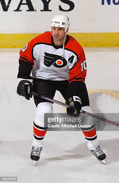 Left wing John LeClair of the Philadelphia Flyers skates on the ice during the game against the Washington Capitals at the MCI Center on March 6,...