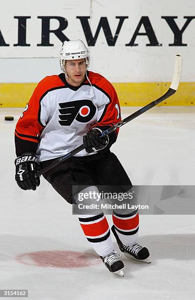 Left wing Simon Gagne of the Philadelphia Flyers practices for the game against the Washington Capitals at the MCI Center on March 6, 2004 in...