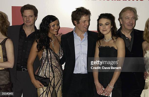 Colin Firth, Martine McCutcheon, Hugh Grant, Keira Knightley, and Alan Rickman arrive at the UK premiere of the film "Love Actually" held at the...
