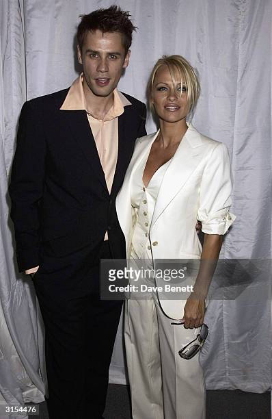 American model/actress Pamela Anderson and British television presenter Richard Bacon attend the "Lycra British Style Awards 2003" held at Old...