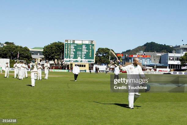 Gary Kirsten of South Africa is clapped off by his team mates as he finishes his test career out for 77 during the 5th day of the 3rd Test between...