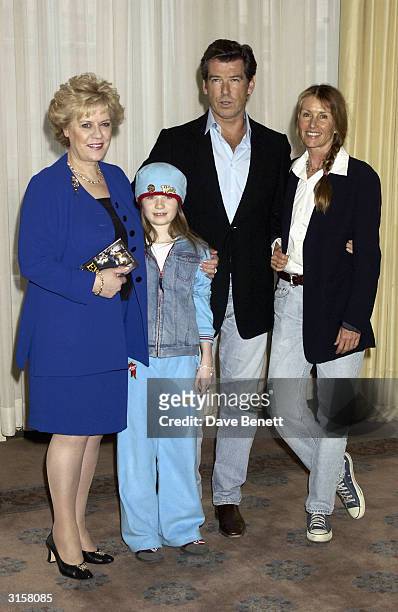 Evelyn Doyle, Sophie Vavasseur, Pierce Brosnan and producer Beau St Clair attend the photo call for film "Evelyn" at Claridges Hotel on March 17,...